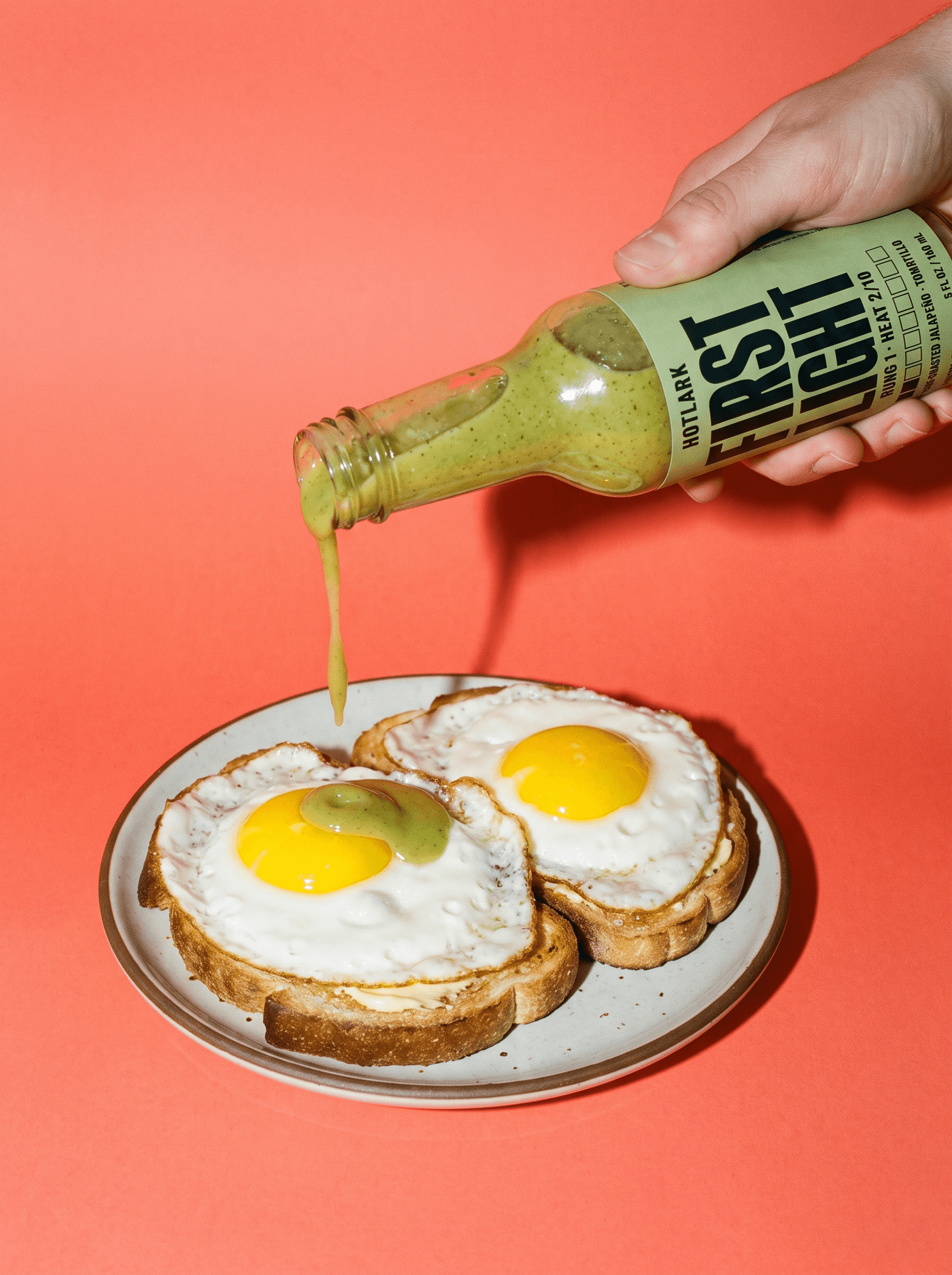 First Light poured over fried eggs on toast